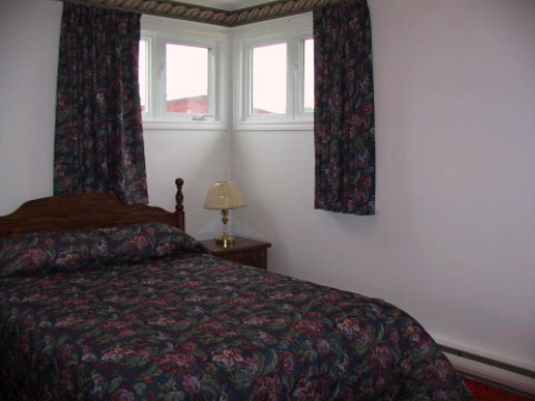 Another bedroom has a double size bed